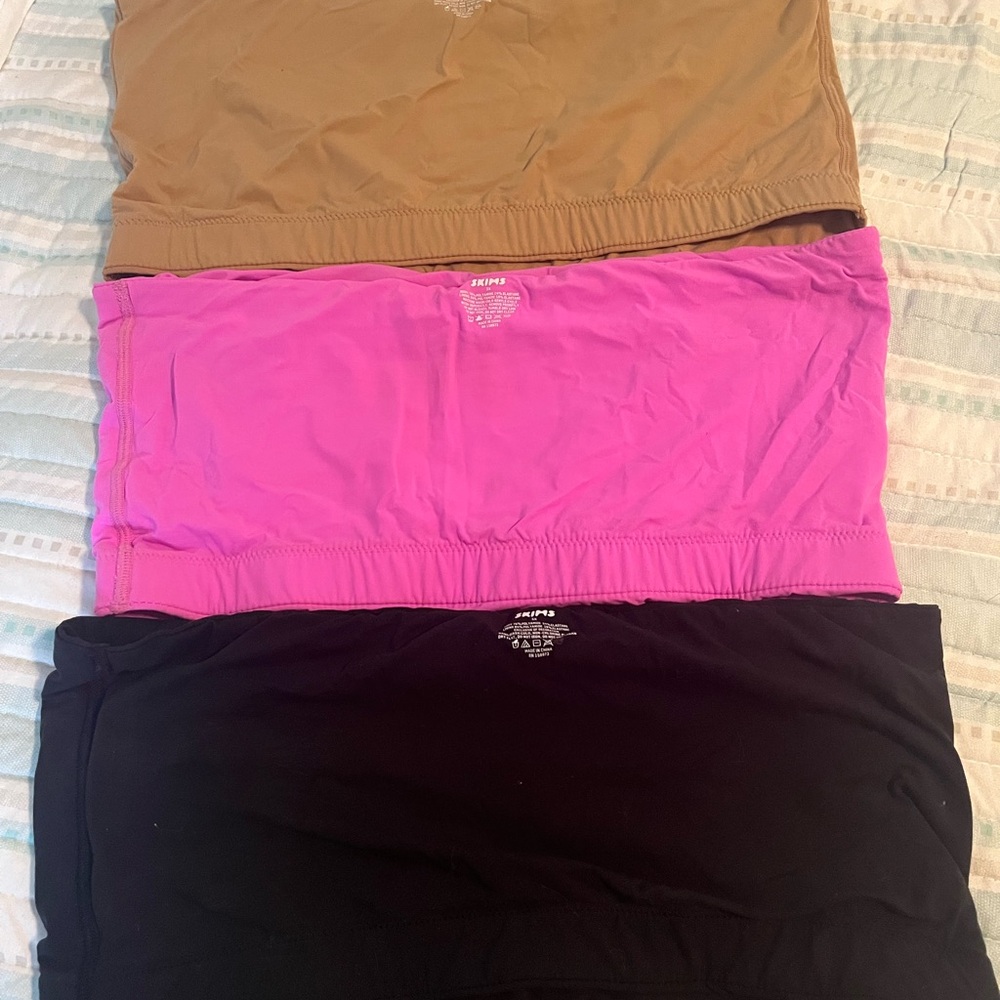 SKIMS Pink and Black Skirts Collection